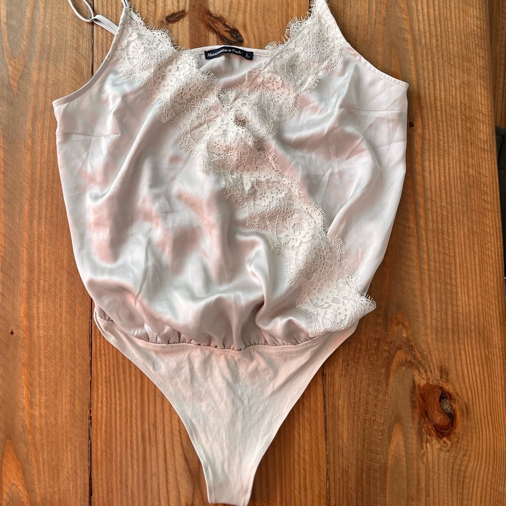 Abercrombie & Fitch women’s large wrap-front lace trimmed champagne body suit